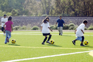 GOS Donation 01 San Filipe Pueblo NM Gear Delivery - Kids Playing Soccer