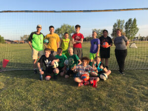 GOS Donation 04 Albuquerque AYSO Gear Delivery - Full Sized Soccer Goal with Boys AYSO Team