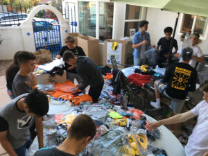 GOS Donation 10 Ecuador Gear Collection Event - Rio Rapids SC Soccer Teams Organizing Gear