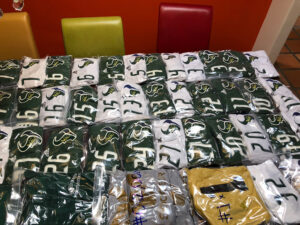 GOS Donation 19 Nigeria Gear Collection - Gift of Soccer Team Soccer Uniform Sorting on Table