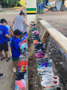 GOS Donation 27 Ecuador Gear Delivery - Kids Getting Shoes