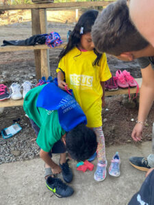 GOS Donation 27 Ecuador Gear Delivery - Kids Getting Shoes