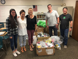 GOS Gear Collection - Gift of Soccer Foundation Team Margie Espe, Ken Levandoski, Chris Gordon Delivering Soccer Gear to Hope Christian High School