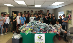 GOS Gear Collection - Rio Rapids Boys Soccer Club Teams cleaned and organized 1,000 pieces of gear with the Gift of Soccer Foundation Team