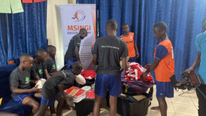 GOS Donation 25 Uganda Gear Delivery - Kids Getting School Supplies and Soccer Gear