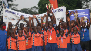 Gift of Soccer Donations to Children Around the World - Team celebrating winning league in Uganda