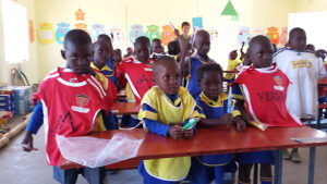 Gift of Soccer Donations Getting to Kids Around the World - Kids getting Gear in Africa