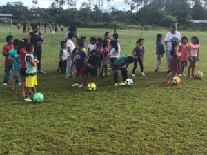 Gift of Soccer Donations Getting to Kids Around the World - Kids Playing Soccer in Ecuador